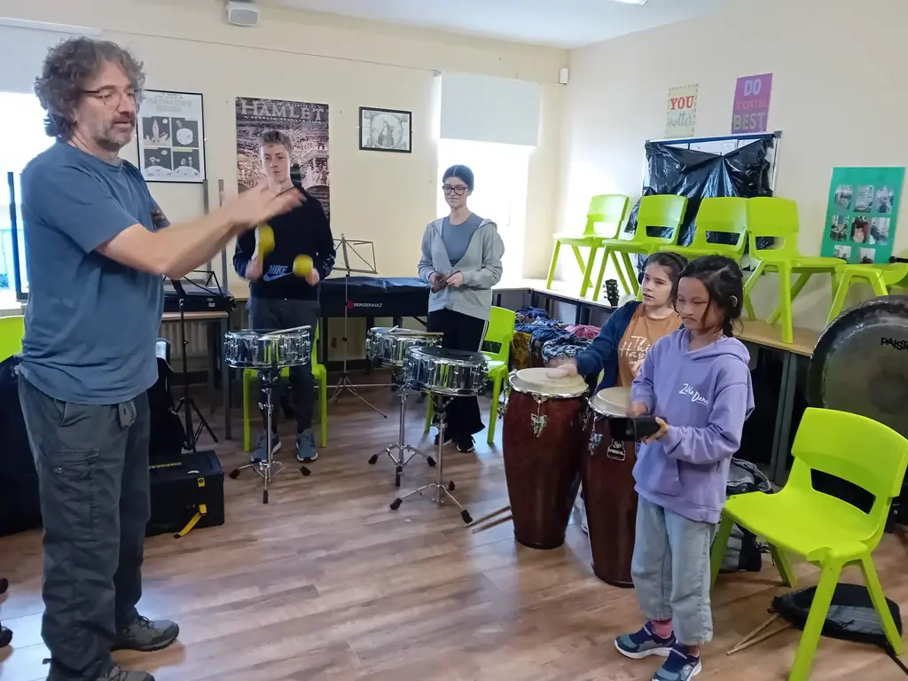 Drums workshop with instructor teaching